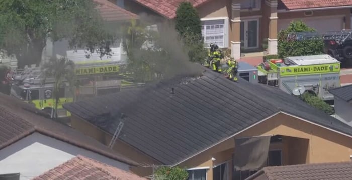 Firefighters fight flames at house in Miami Lakes