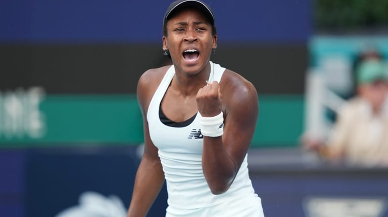 Coco Gauff celebrates a point against Karolina Muchova, of the...