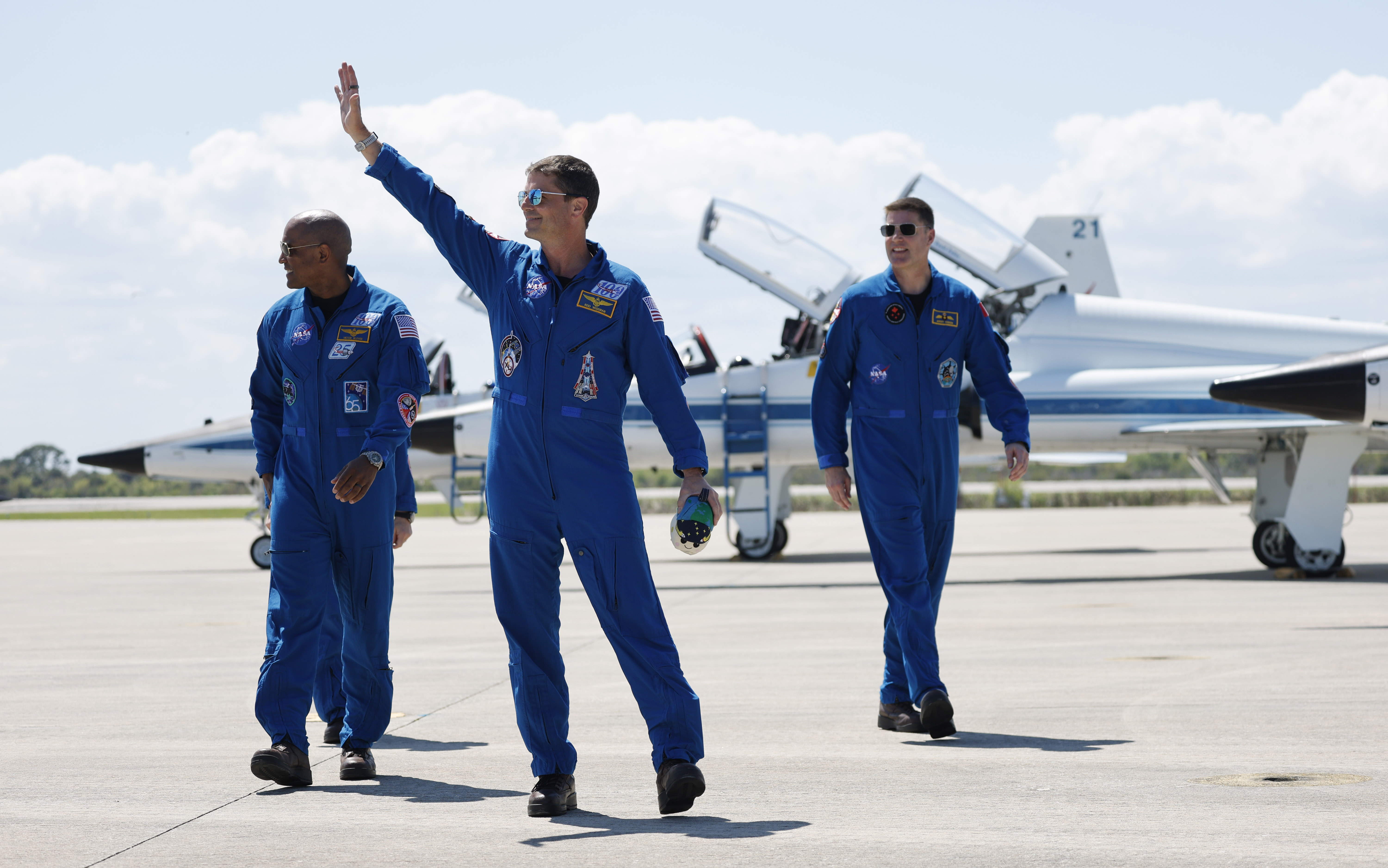 From left, Artemis II pilot Victor Glover, commander Reid Wiseman,...
