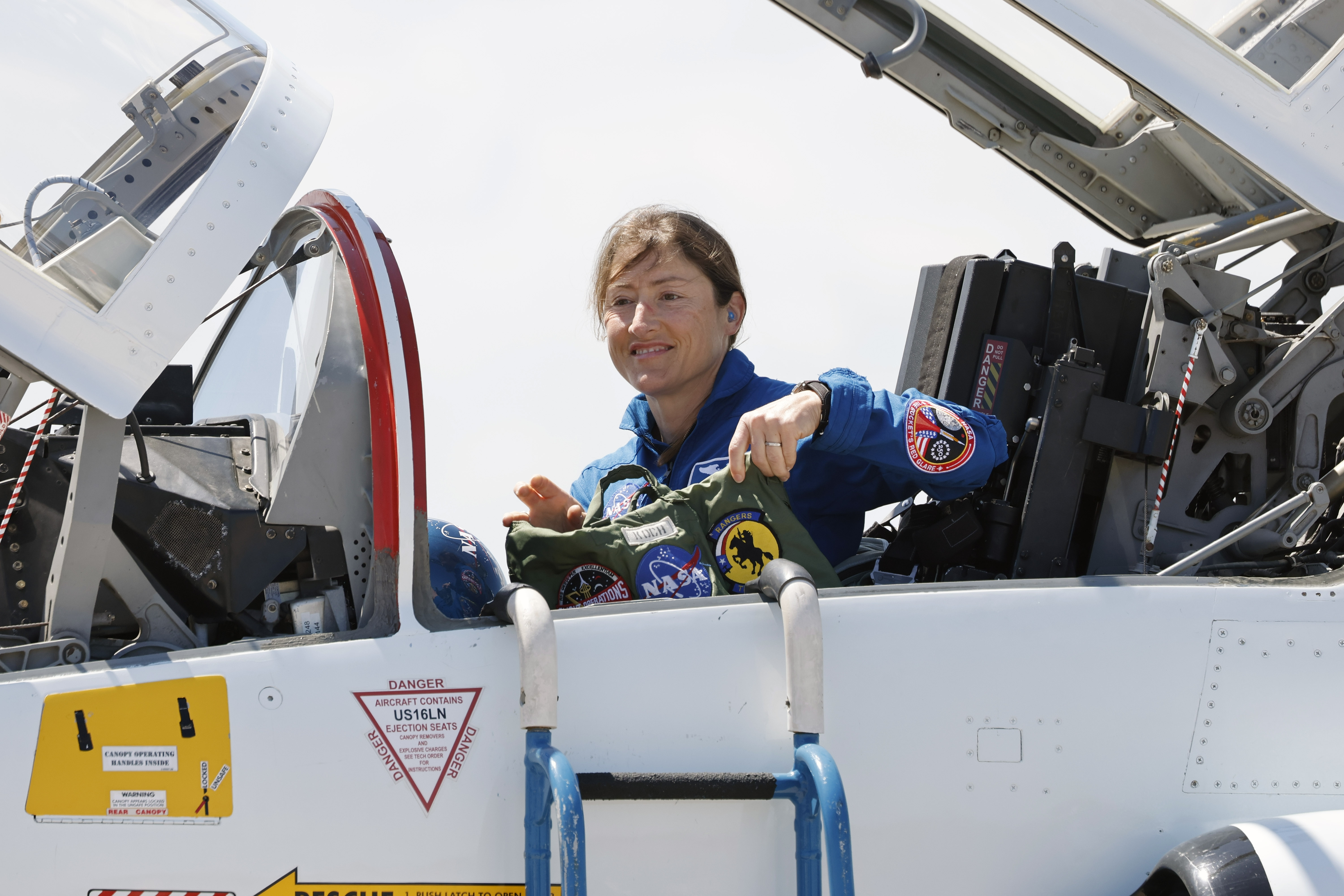 Artemis II mission specialist Christina Koch arrives at the Shuttle...