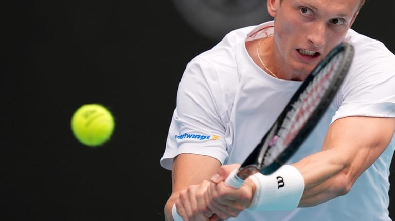 Jiri Lehecka of Czech Republic plays a ball in his...