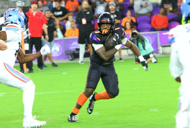 Orlando Storm running back Jashaun Corbin runs toward a first-quarter touchdown during the Orlando Storm's debut UFL game Sunday night, March 29, 2026, at Inter&Co Stadium. (Chris Hays/Orlando Sentinel)