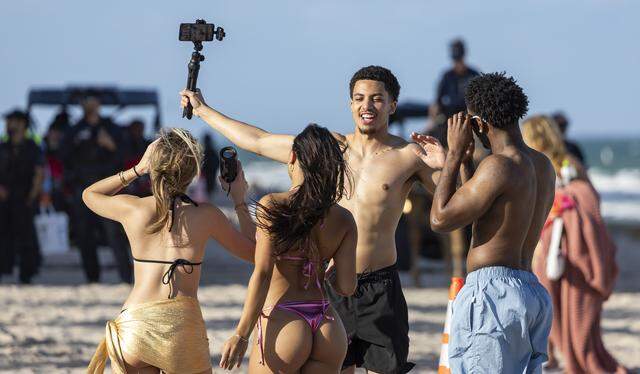 People visit Las Olas Beach during spring break on Friday, March 20, 2026, in Fort Lauderdale, Fla.