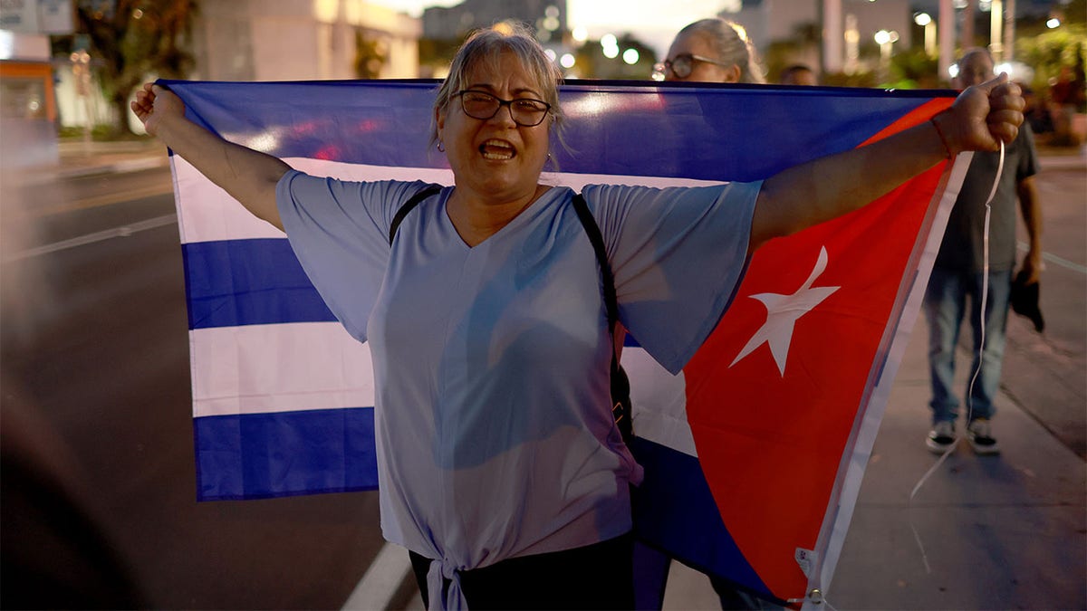 Adam Moreno joins people in the Little Havana neighborhood