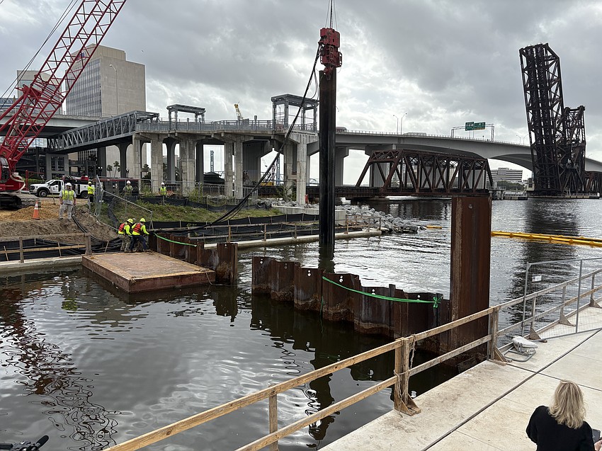 Water from McCoys Creek flows into the St. Johns River on the Downtown Northbank. East of the creek is the Acosta Bridge and CSX headquarters.