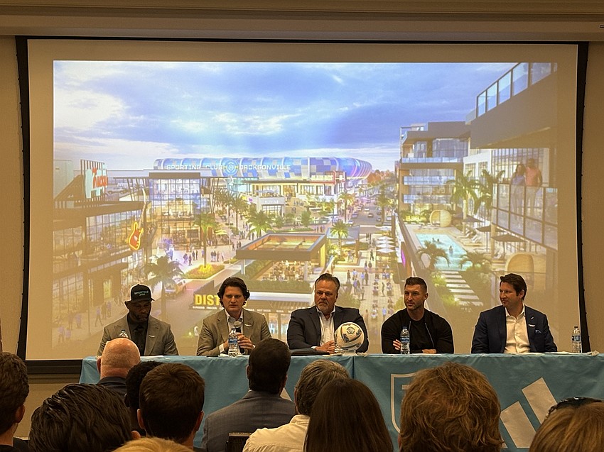 From left: Fred Taylor, Justin Papadakis, Michael McNaughton, Tim Tebow and Ricky Caplin introduce Sporting JAX’s planned mixed-use development.