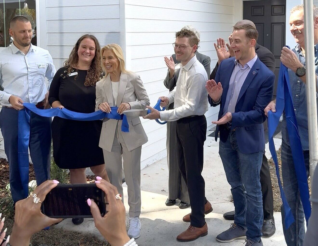 Jacksonville Mayor Donna Deegan participates in a ribbon-cutting for a house touted as being permanently affordable.
