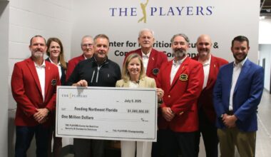 Red Coats and other officials representing THE PLAYERS Championship announce a $1 million pledge to Feeding Northeast Florida on July 9.