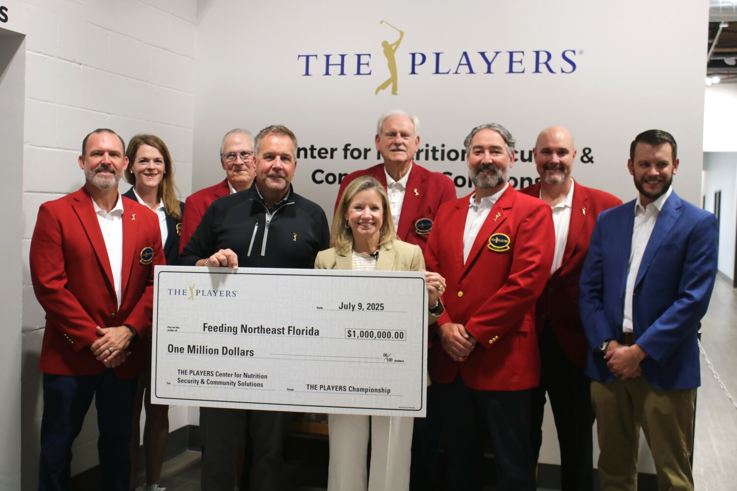 Red Coats and other officials representing THE PLAYERS Championship announce a $1 million pledge to Feeding Northeast Florida on July 9.