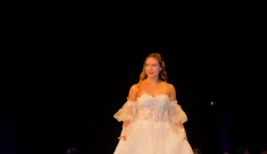 The Bridal Collection Fashion Show showcased several wedding dresses and tuxedoes.