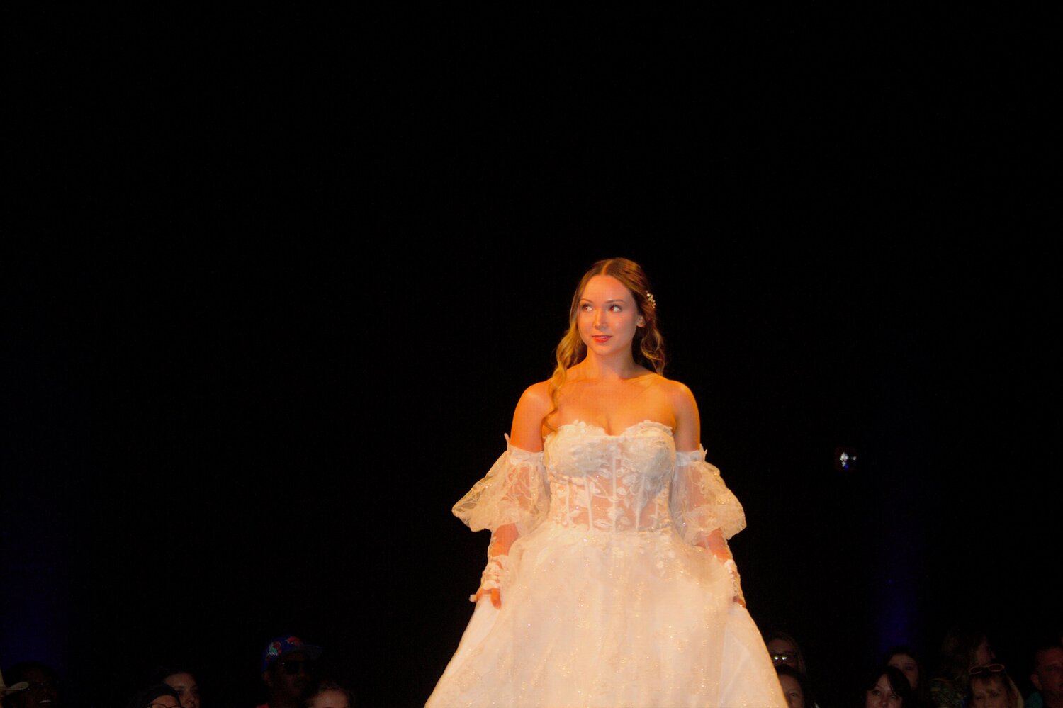The Bridal Collection Fashion Show showcased several wedding dresses and tuxedoes.