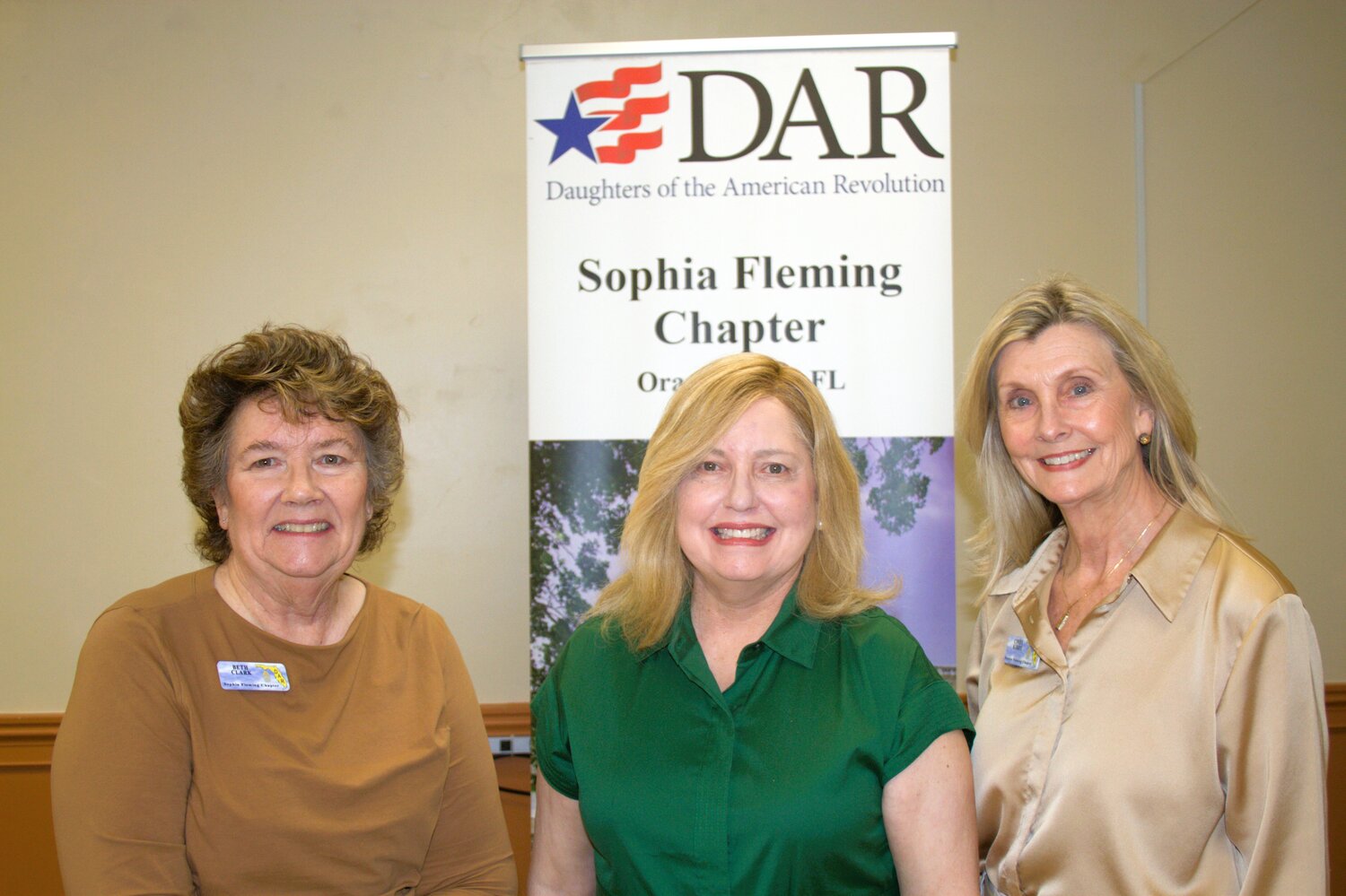 From left, DAR presenter Beth Clark is joined by Community Service Award recipients Connie Thomas and Wynema Lovell.