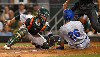 CORAL GABLES, FL - FEBRUARY 27: Miami catcher Alex Sosa (13) tags Florida outfielder Cash Strayer (26) out at home to end the eighth inning as the Miami Hurricanes faced the Florida Gators on February 27, 2026, at Mark Light Field at Alex Rodriguez Park in Coral Gables, Florida. (Photo by Samuel Lewis/Icon Sportswire via Getty Images)