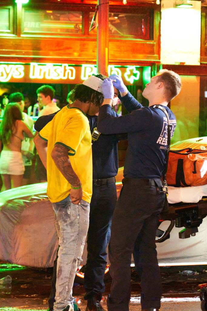 The Spring Breaker receiving medical treatment for his head injury. Romain Maurice