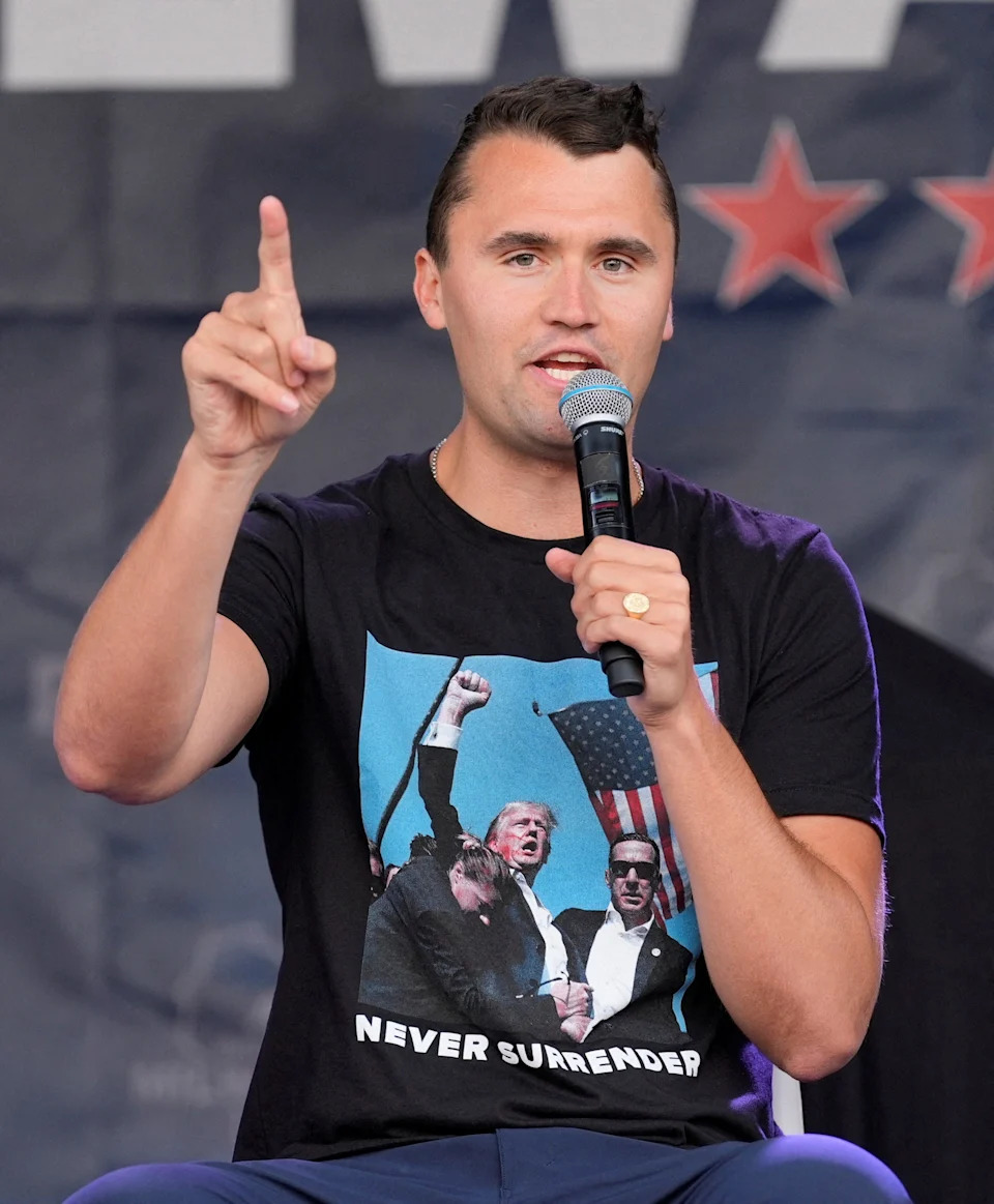 Conservative activist Charlie Kirk, wearing a shirt depicting Republican presidential nominee Donald Trump reacting defiantly after his attempted assassination, addresses supporters in Milwaukee, Wisconsin, on July 17, 2024.