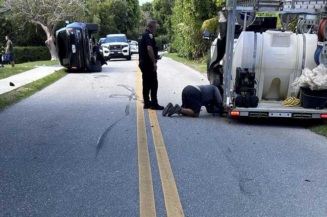 Scene photos from the crash involving Tiger Woods in South Florida. scene photos from the crash involving tiger woods in south florida.