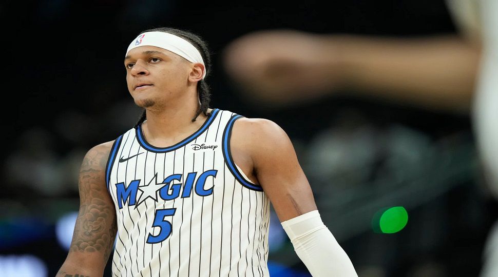 Orlando Magic's Paolo Banchero looks on during the first half of an NBA basketball game against the Milwaukee Bucks, Sunday, March 8, 2026, in Milwaukee. (AP Photo/Aaron Gash)