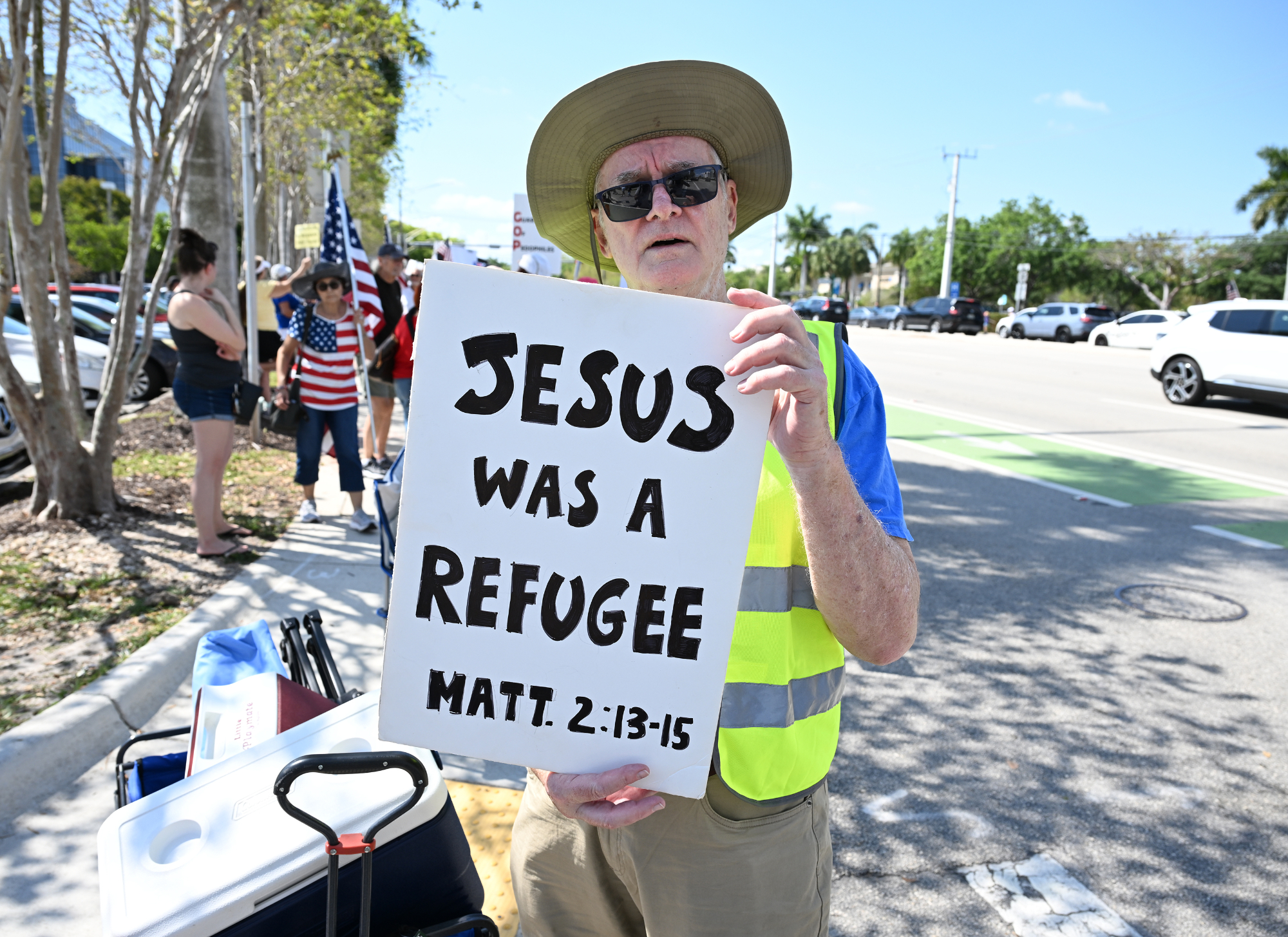Sign reads: Jesus was a refugee.