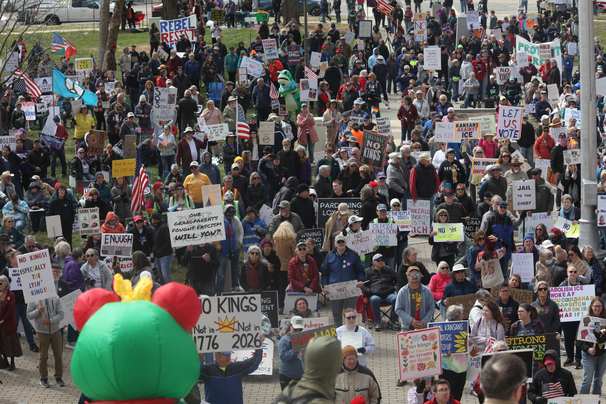 A large crowd gathers.