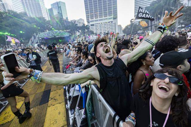 Maj Jelen, from Slovenia, cheers as Excision performs during Ultra Music Festival’s 26th anniversary at Bayfront Park on Saturday, March 28, 2026, in downtown Miami, Fla.