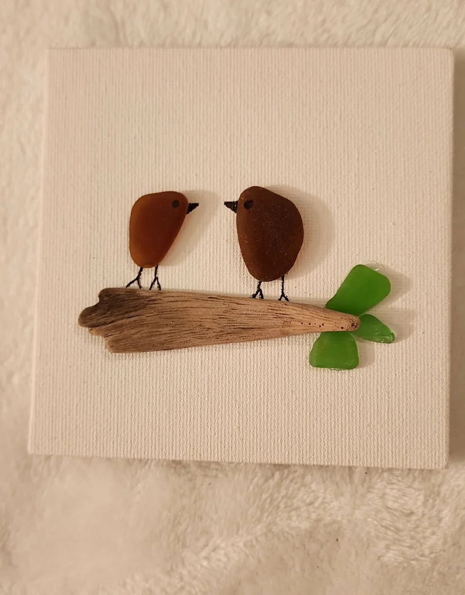 This is an example of artwork made by North Naples resident Sara Breault. She used "trash" like glass, wood and tile she found at the beach after hurricanes to make this and other pieces of art.