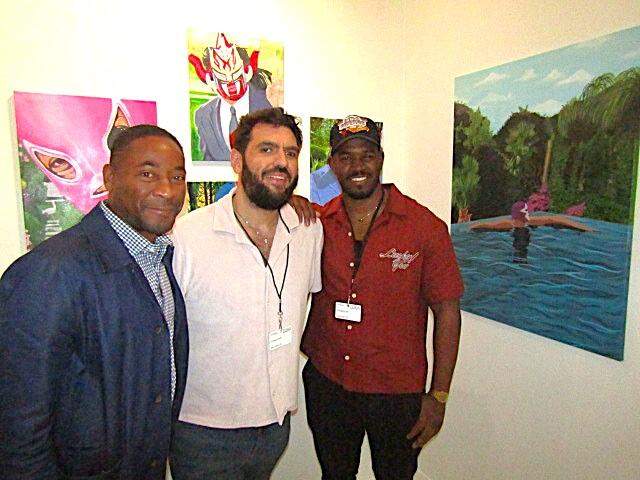 At NADA (New Art Dealers Alliance) in 2024 during Miami Art Week with debuting artist and All Elite Wrestling ROH Pure Champ Lee Moriarty (pictured right), presented by Orange Crush (the journal of art and pro wrestling), which is led by NADA board member Adam Abdalla (pictured middle), who is also the president of Orange Crush and the Cultural Counsel. Also pictured (left), Franklin Sirmans, an art critic, editor, writer, curator and the director of the Pérez Art Museum Miami.