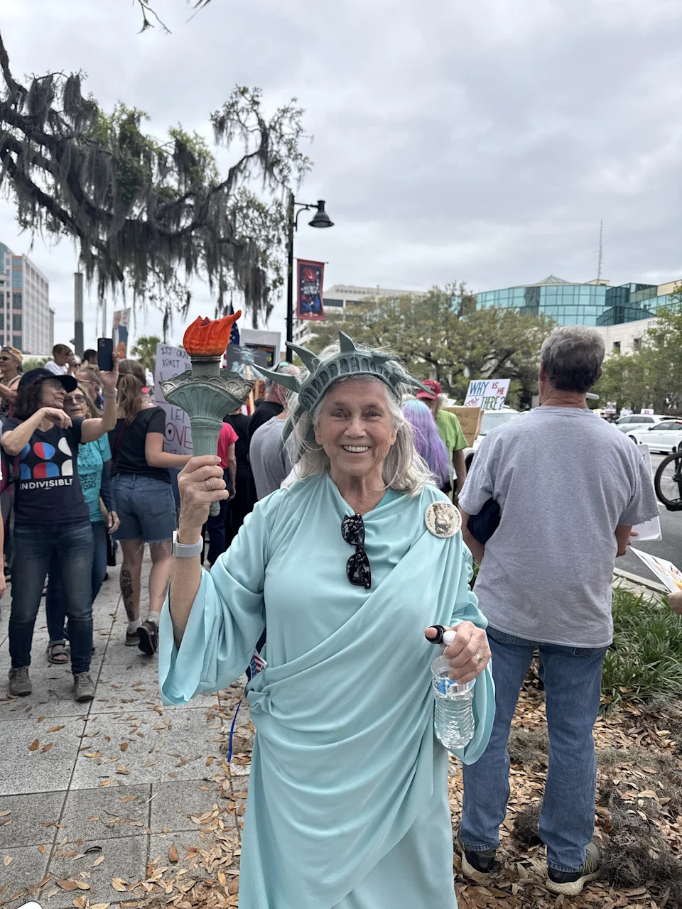 Rebecca Clemans, wearing a Lady Liberty costume, said she was concerned that Trump was taking America to war with Iran without congressional approval.