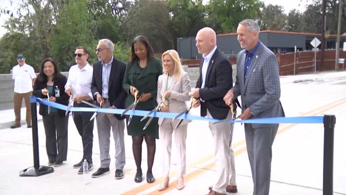 Mayor Deegan, city officials celebrate opening of Stockton Street Bridge as part of McCoys Creek restoration