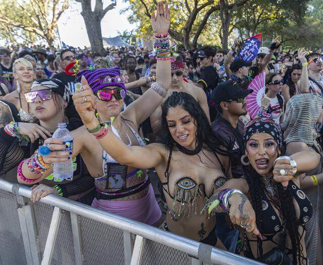 From left to right: Kaytlin Toth, 23, from Daytona, Amy Jarman, 26, from Cincinnati, Raquel Cruz, 23, from Las Vegas, and Zoe Trujillo, 30, from Las Vegas, dance as Armnhmr performs during Ultra Music Festival’s 26th anniversary at Bayfront Park on Saturday, March 28, 2026, in downtown Miami, Fla.
