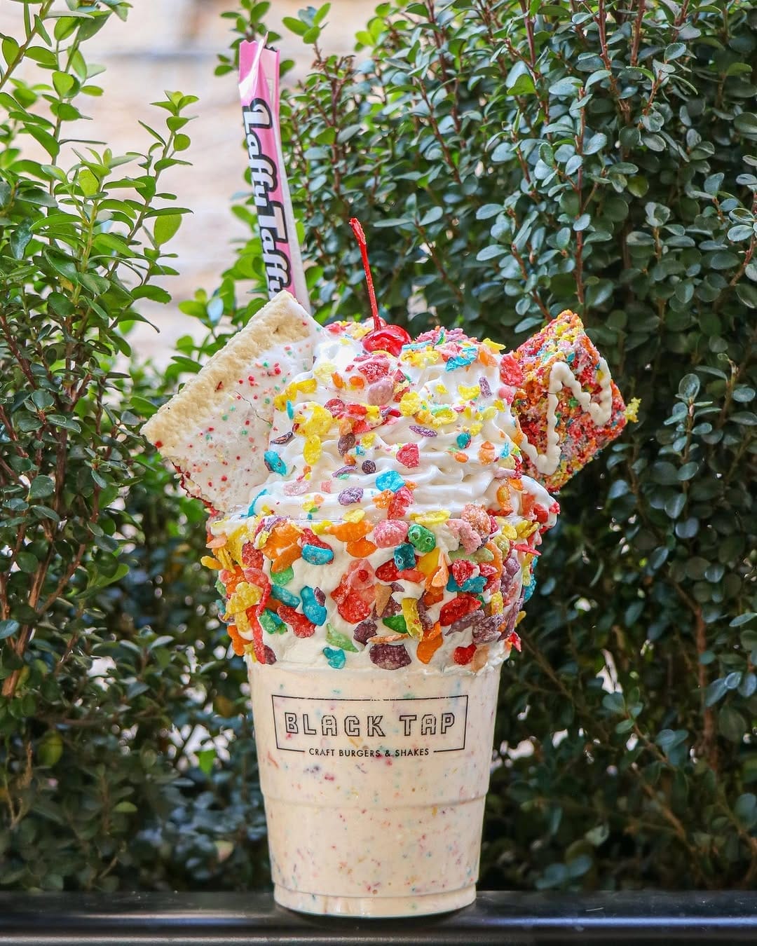 CrazyShake serves Instagrammable shakes, including the Special Edition Mickey Mouse Shake — rimmed with vanilla frosting, Mickey sprinkles, and topped with a homemade Mickey-shaped crispy treat, rock candy, whipped cream, and a cherry. See the full menu below: