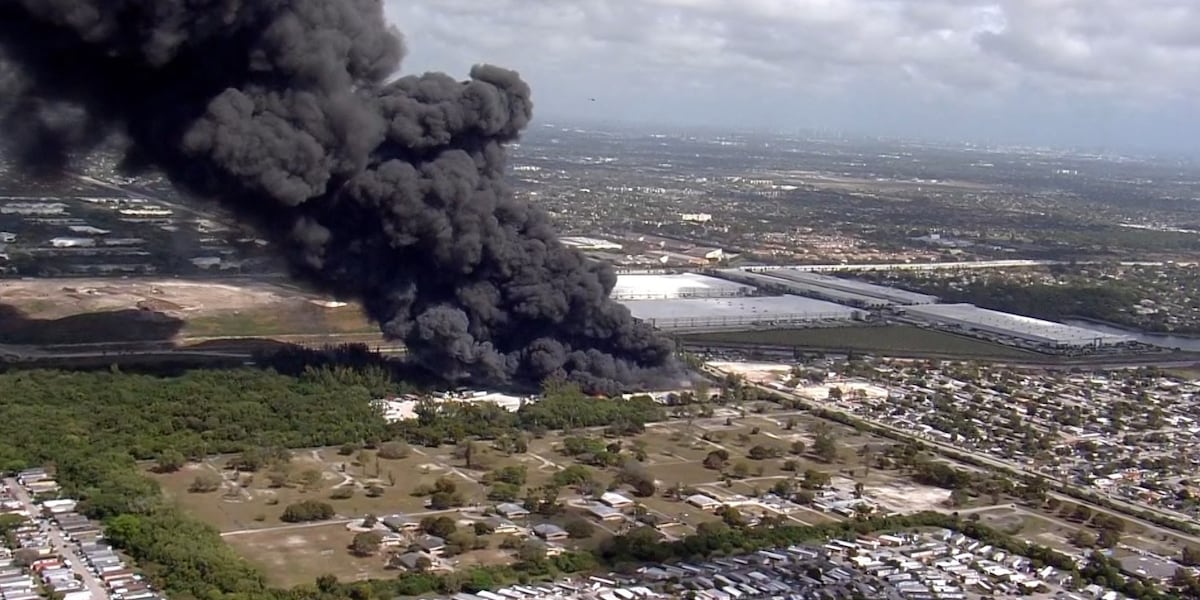 Four-alarm warehouse fire burns near Florida Turnpike in Northwest Miami-Dade