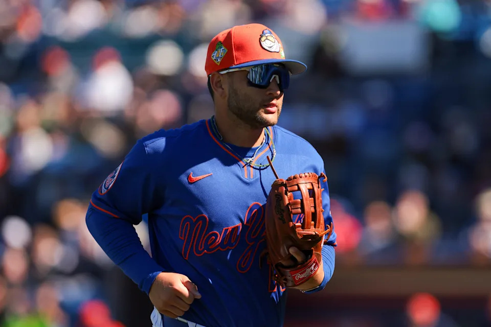 New York Mets third baseman Bo Bichette (19) returns to the dugout against the Houston Astros during the third inning on Feb. 24, 2026, at Clover Park.