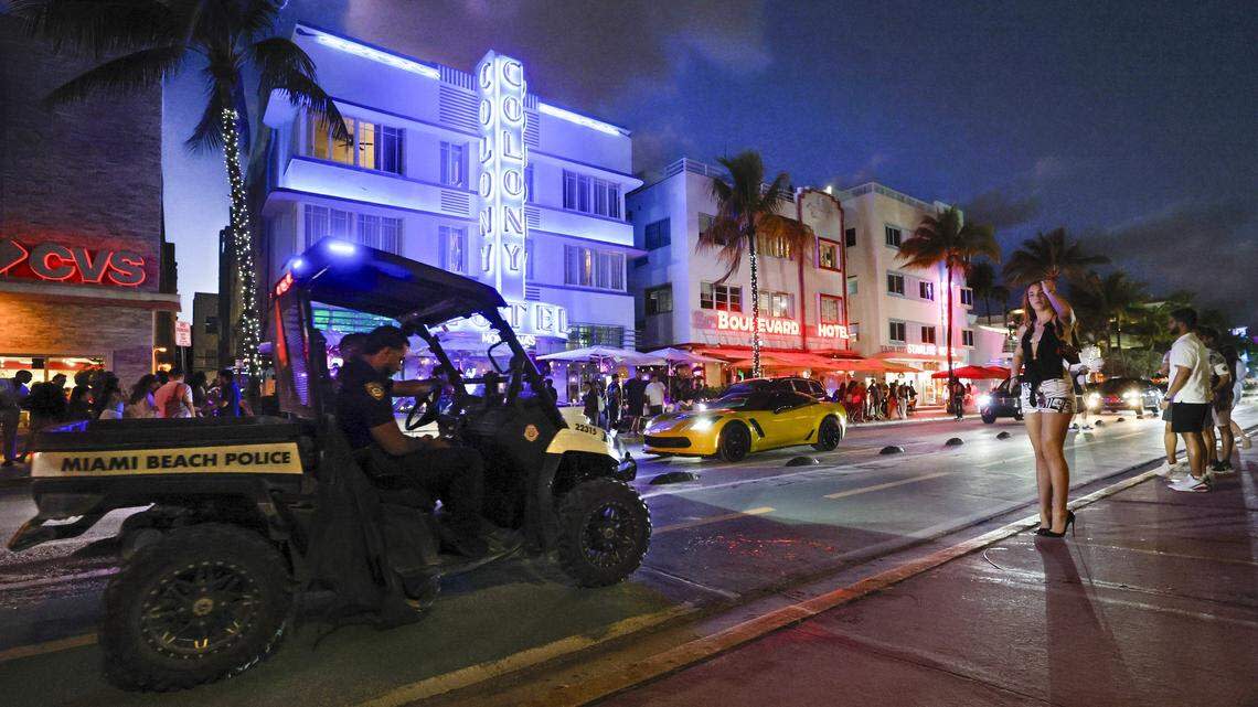 Miami Beach police officers patrol Ocean Drive during spring break in South Beach, Friday, March 20, 2026.