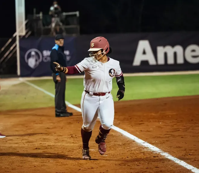 Jaysoni Beachum walks with a smile after hitting a home run against No. 7 UCLA. No. 6 Florida State softball defeated the Bruins, 11-7 on Saturday, Feb. 14