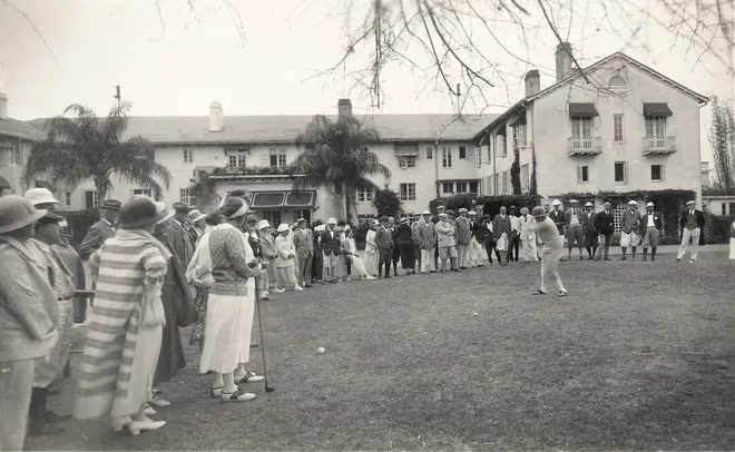American legend Glenna Collett Vare tees off in the 1924 Florida Championship at Mountain Lake.