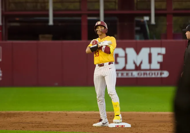 Noah Sheffield celebrates a double as FSU baseball wore their throwback “mustard” jerseys as the Seminoles hosted Jacksonville on Tuesday, March. 3, 2026 at Dick Howser Stadium