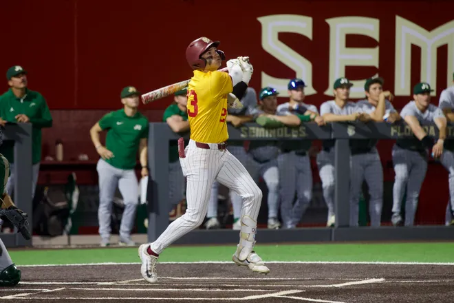 Brody DeLamielleure watches and celebrates his home run as FSU baseball wore their throwback “mustard” jerseys as the Seminoles hosted Jacksonville on Tuesday, March. 3, 2026 at Dick Howser Stadium