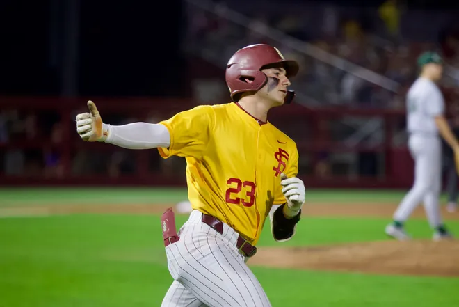 Brody DeLamielleure watches and celebrates his home run as FSU baseball wore their throwback “mustard” jerseys as the Seminoles hosted Jacksonville on Tuesday, March. 3, 2026 at Dick Howser Stadium