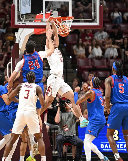 Mar 7, 2026; Tallahassee, Florida, USA; Florida State Seminoles guard Lajae Jones (10) dunks the ball during the first half against the Southern Methodist Mustangs at Donald L. Tucker Center. Mandatory Credit: Melina Myers-Imagn Images