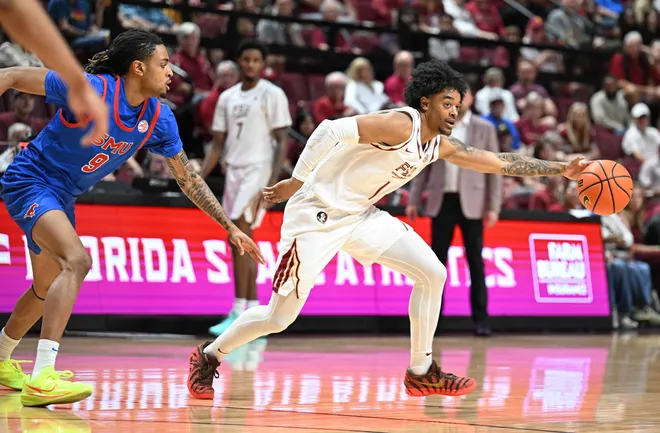 Mar 7, 2026; Tallahassee, Florida, USA; Florida State Seminoles guard Martin Somerville (1) grabs a loose ball during the first half against the Southern Methodist Mustangs at Donald L. Tucker Center. Mandatory Credit: Melina Myers-Imagn Images