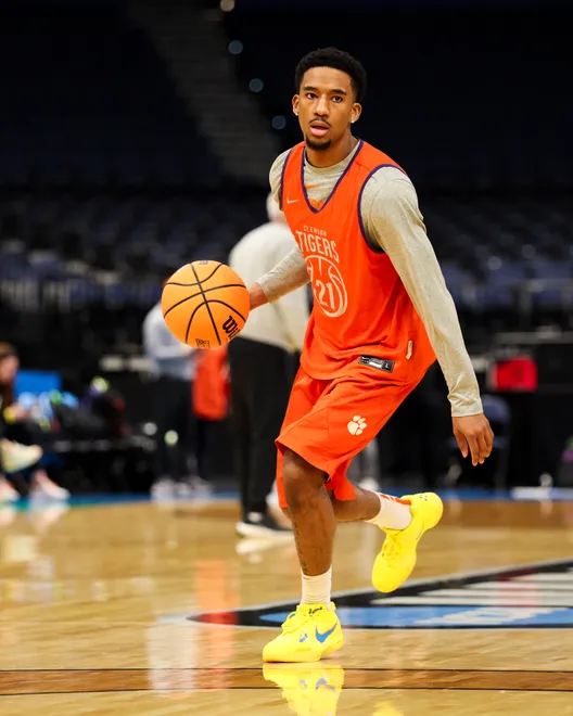 Mar 19, 2026; Tampa, FL, USA; Clemson Tigers guard Ace Buckner (21) participates in a practice session ahead of the first round of the men's 2026 NCAA Tournament at Benchmark International Arena. Mandatory Credit: Nathan Ray Seebeck-Imagn Images