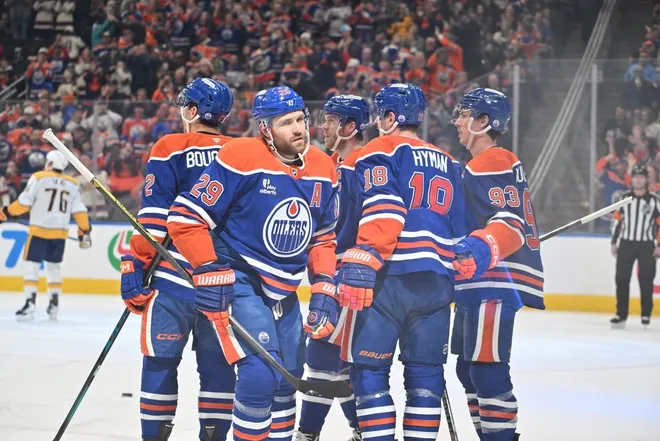Mar 15, 2026; Edmonton, Alberta, CAN; Edmonton Oilers center Leon Draisaitl (29), left wing Zach Hyman (18) and Oilers center Ryan Nugent-Hopkins (93) celebrate a goal on Nashville Predators goalie Justus Annunen (29) during the first period at Rogers Place.