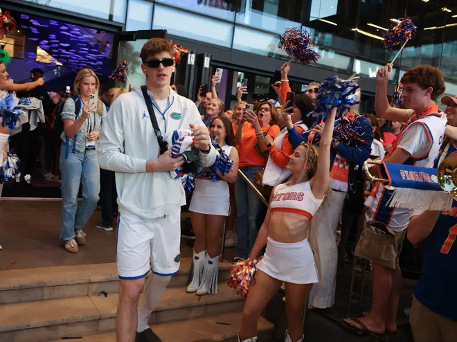 Florida players head to the bus before the NCAA March Madness opening round at JW Marriott in Tampa, FL on Friday, March 20, 2026. Several hundred people cheered Florida as they left to go to the arena. [Alan Youngblood/Gainesville Sun]
