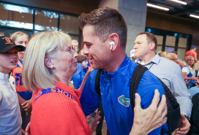 Florida head coach Todd Golden greets family before the NCAA March Madness opening round at JW Marriott in Tampa, FL on Friday, March 20, 2026. Several hundred people cheered Florida as they left to board the bus for to go to the arena. [Alan Youngblood/Gainesville Sun]