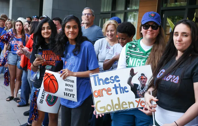Florida fans and cheerleaders get fired up before the NCAA March Madness opening round at JW Marriott in Tampa, FL on Friday, March 20, 2026. Several hundred people cheered Florida as they left to board the bus for to go to the arena. [Alan Youngblood/Gainesville Sun]