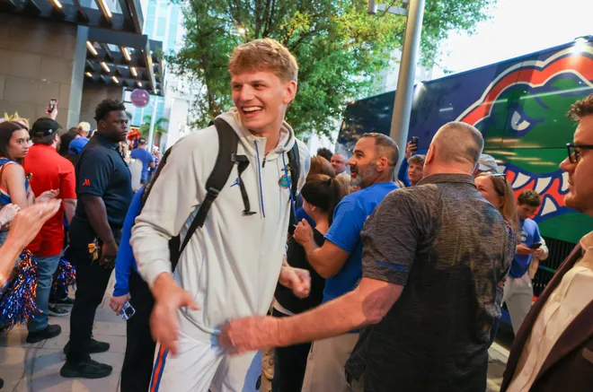Florida players head to the bus before the NCAA March Madness opening round at JW Marriott in Tampa, FL on Friday, March 20, 2026. Several hundred people cheered Florida as they left to go to the arena. [Alan Youngblood/Gainesville Sun]