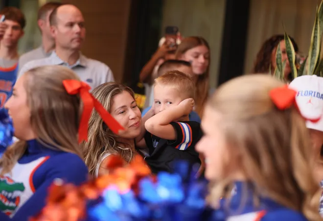 Florida fans and cheerleaders get fired up before the NCAA March Madness opening round at JW Marriott in Tampa, FL on Friday, March 20, 2026. Several hundred people cheered Florida as they left to board the bus for to go to the arena. [Alan Youngblood/Gainesville Sun]