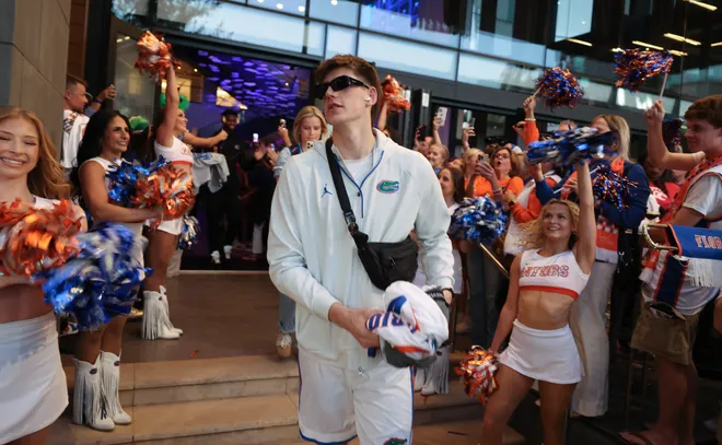 Florida players head to the bus before the NCAA March Madness opening round at JW Marriott in Tampa, FL on Friday, March 20, 2026. Several hundred people cheered Florida as they left to go to the arena. [Alan Youngblood/Gainesville Sun]