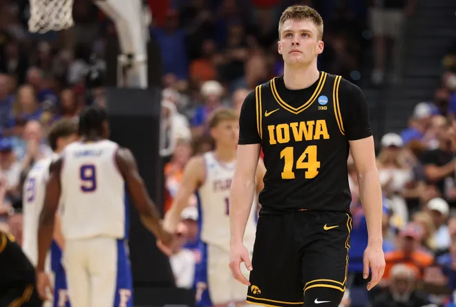 Mar 22, 2026; Tampa, FL, USA; Iowa Hawkeyes guard Bennett Stirtz (14) looks on against the Florida Gators in the first half during a second round game of the men's 2026 NCAA Tournament at Benchmark International Arena. Mandatory Credit: Nathan Ray Seebeck-Imagn Images