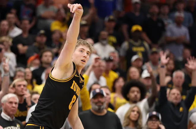 Mar 22, 2026; Tampa, FL, USA; Iowa Hawkeyes forward Cooper Koch (8) holds his follow through on a shot against the Florida Gators in the second half during a second round game of the men's 2026 NCAA Tournament at Benchmark International Arena. Mandatory Credit: Nathan Ray Seebeck-Imagn Images